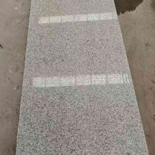 宁波芝麻白光面毛板